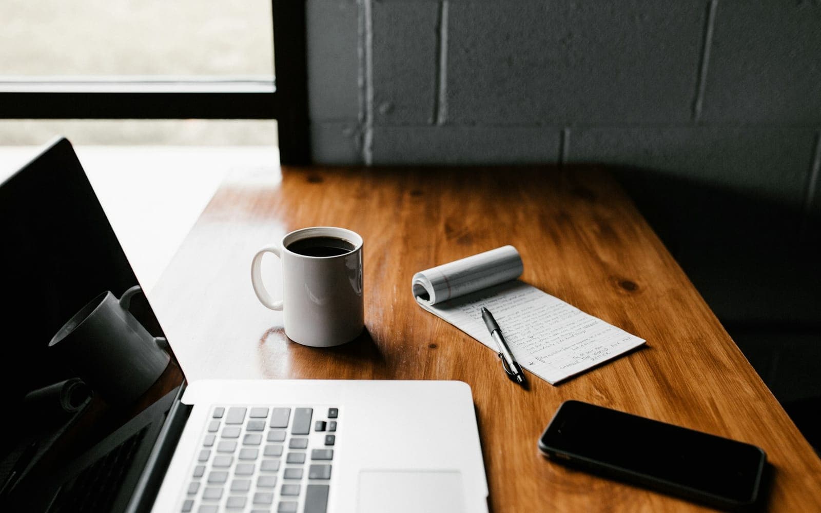 Photograph and design materials on a creative workspace desk