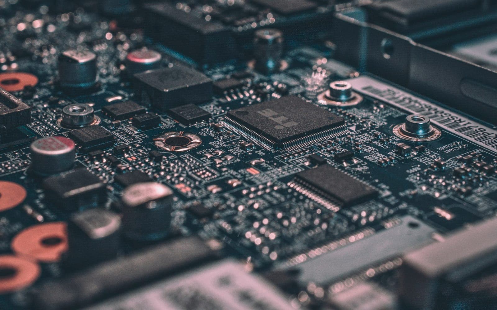 Close-up of a glowing circuit board suggesting intelligent software