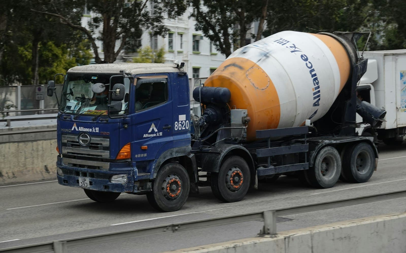 Concrete mixer truck delivering ready-mix concrete to a site