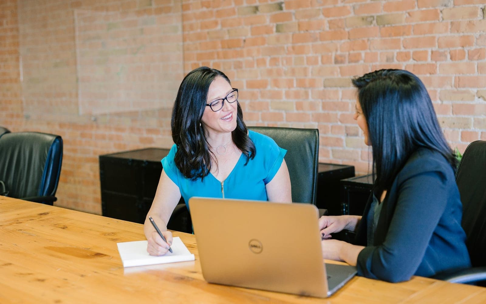 Professional reviewing assessment documents in an office