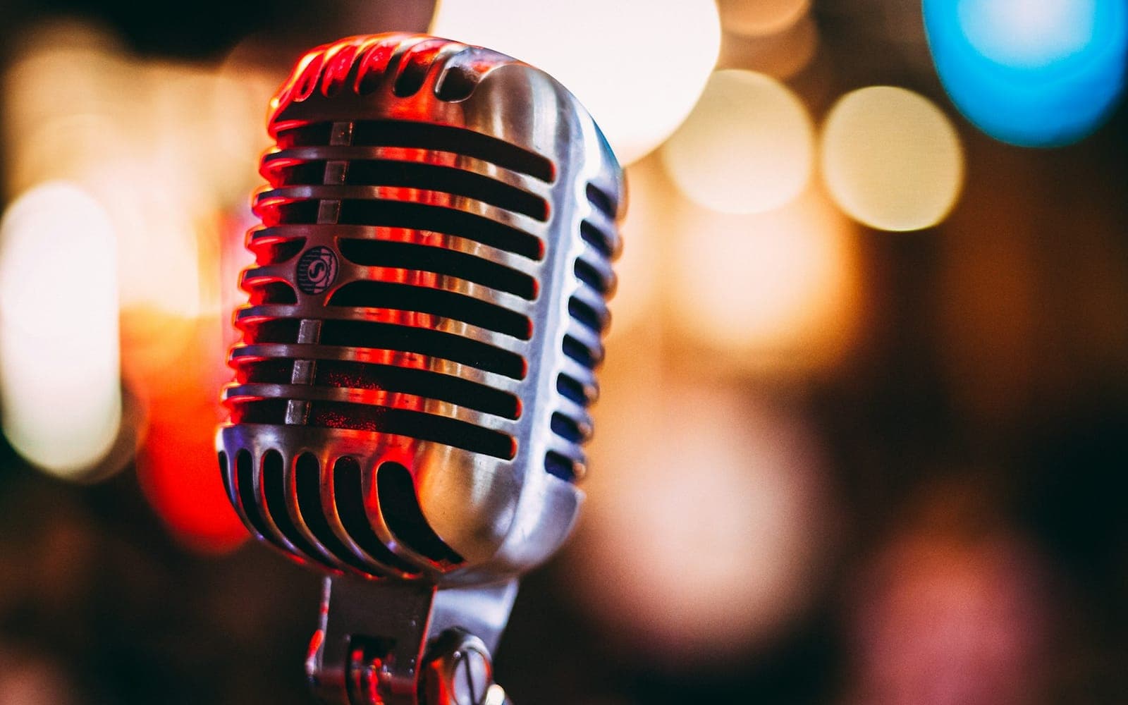 Microphone and stage lighting ready for a filmed narrative